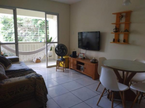 Quartos em apartamento rústico e aconchegante